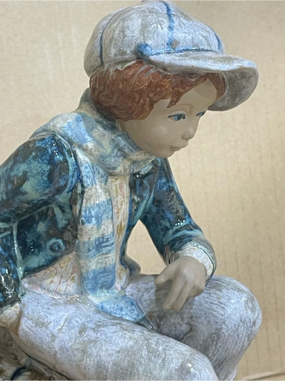 Kid Porcelian Sculpture “Sitting on Cargo” a Porcelana Artistica Levantina PAL